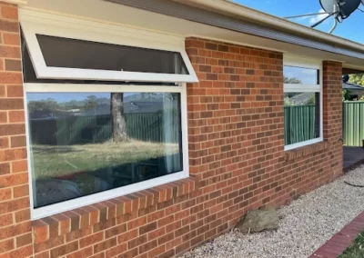 Modern Awning Windows replacing rotting timber frames